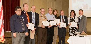 During the chapter's 55th anniversary celebration in June, chapter members of the board receiving certificates of appreciation are (l-r) Rod Trevino, Stu Carter, Ray Faubel, Harry Bowen, Dan Guilmette, Shari Brabham, Larry Bingaman, Way and Besselman.